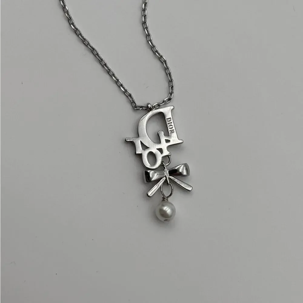 Christian Dior Silver Ribbon Pearl Pendant Necklace - Picture 3 of 6